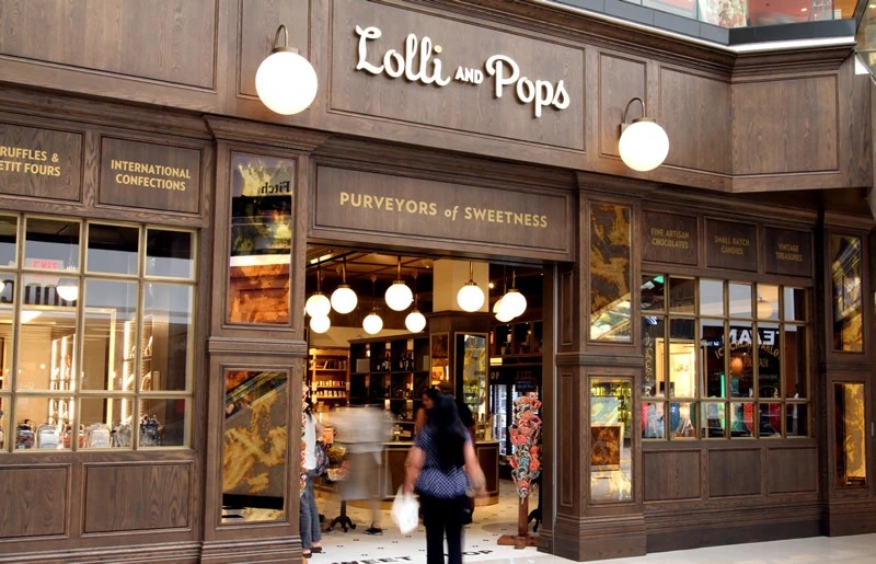 Lolli & Pops, candy store · national rollout interior, Multiple U.S. Locations, designed as part of the creative team at Pompei A.D.